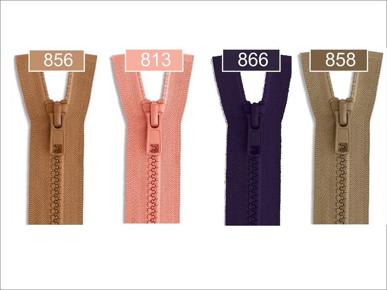 May include: Four plastic zippers arranged side-by-side in tan, coral, dark purple, and beige. Each zipper features a matching pull tab and a rectangular label at the top displaying the color codes 856, 813, 866, and 858 respectively.