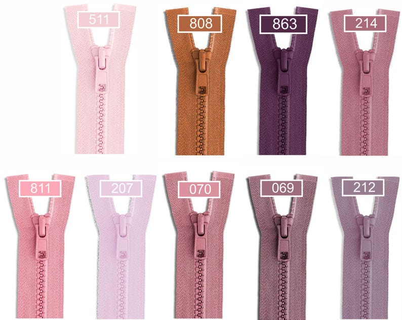 May include: A collection of ten plastic zippers in various shades of pink, purple, and brown, arranged in two rows. Each zipper features a matching pull tab and a rectangular label with a specific color code number: 511, 808, 863, 214, 811, 207, 070, 069, and 212.