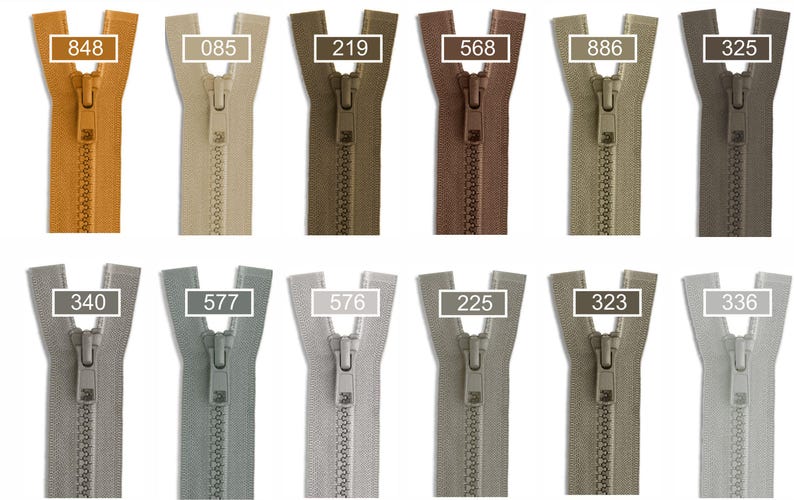 May include: A collection of twelve plastic zippers arranged in two rows, featuring various neutral and earth-toned colors. Each zipper includes a slider and a pull tab, with numerical labels 848, 085, 219, 568, 886, 325, 340, 577, 576, 225, 323, and 336.