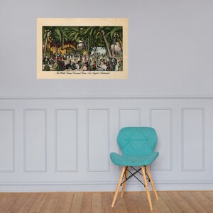 May include: A vintage postcard depicting a scene from the World Famous Coconut Grove in Los Angeles, California. The postcard shows a large outdoor dining area with palm trees and people enjoying a meal.