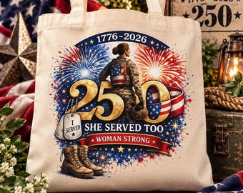 May include: A beige canvas tote bag featuring a graphic of a soldier in camouflage with an American flag backpack, surrounded by fireworks. Text reads 1776-2026, 250, SHE SERVED TOO, WOMAN STRONG, and I SERVED on dog tags. Includes brown combat boots.