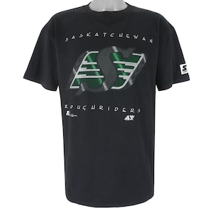 May include: Black t-shirt with a green and white Saskatchewan Roughriders logo. The text "Saskatchewan Roughriders" is printed on the shirt.