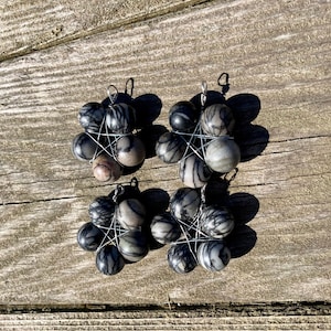 Black Jasper “Spiderweb” beads in Silver Star Wrap