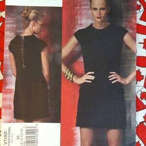 May include: A black dress sewing pattern with a zip detail on the back. The pattern is for sizes 8-10-12-14. The pattern is by Cynthia Steffe for Vogue Patterns American Designer.
