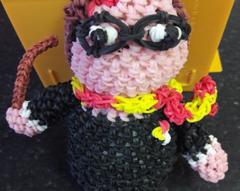 Harry Potter in gown with wand