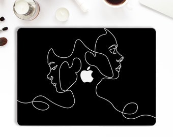 May include: Black laptop skin with a white line drawing of two faces, one on top of the other, with the Apple logo in the center.