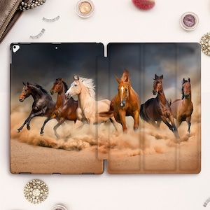 May include: Five horses running through a dusty desert landscape. The horses are brown, white, and black. The image is a digital illustration.