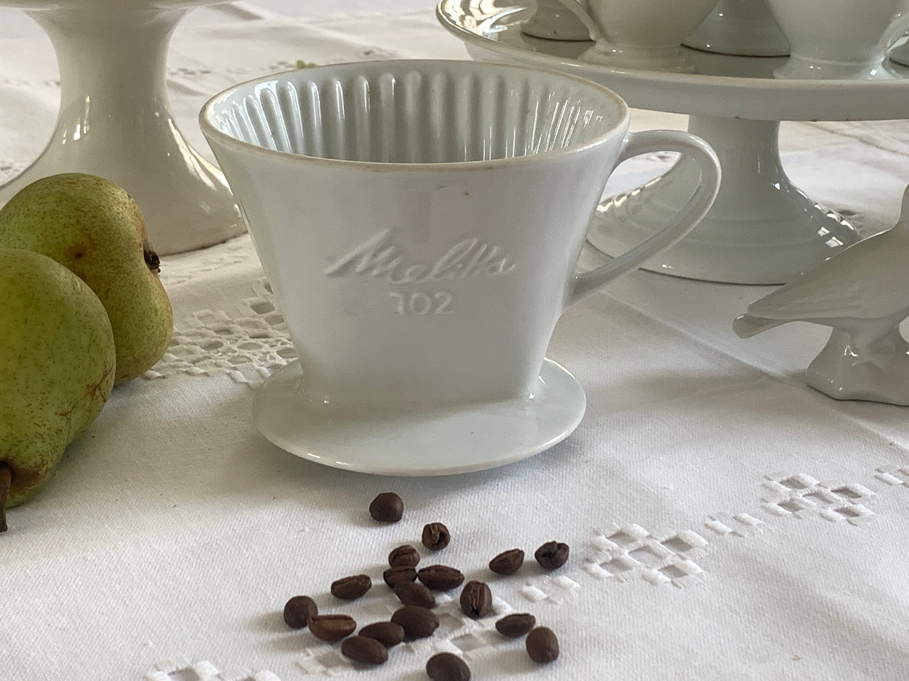 vintage melitta 102 filtre à café en céramique blanche goutte porcelaine verser sur une cafetière goutte