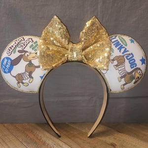 May include: A rustic wooden sign with the text "Welcome to our home" in white lettering. The sign features a distressed finish and a simple, inviting design, perfect for front door decor.