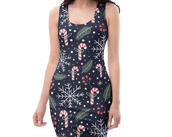 May include: A sleeveless tank dress featuring a dark navy blue background with a repeating holiday pattern of white snowflakes, red and white striped candy canes, green pine needles, and small clusters of red berries scattered throughout.