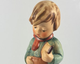 hummel boy with bird