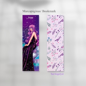 May include: Two bookmarks. One shows a woman with purple hair in a black dress against a starry purple backdrop. The other has a floral pattern with lavender, pink, and blue flowers. Text on the bookmarks reads "Marcáginas/ Bookmark" and "SarAngelyst".