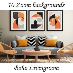 May include: A living room with a blue sofa, two wicker chairs, and a coffee table. The walls are a light beige colour and there are three framed abstract art prints above the sofa. The art prints feature geometric shapes in orange, black, and white.