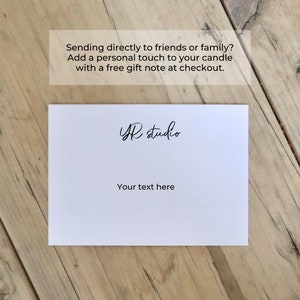 May include: White card with black text that reads "YR studio" and "Your text here".