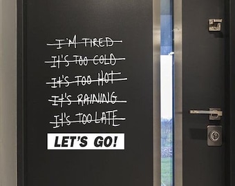 May include: A black door with a white motivational message written on it. The message reads "I'm tired - It's too cold - It's too hot - It's raining - It's too late - Let's go!"