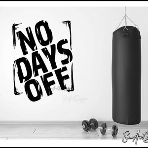 May include: Black and white motivational quote "NO DAYS OFF" in a distressed font style, with a black punching bag hanging from the ceiling and dumbbells on the floor.