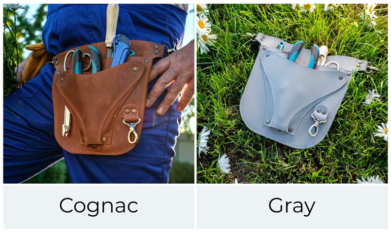 May include: Two leather tool belts, one brown and one gray, with a variety of gardening tools, including pruning shears, a knife, and a small trowel. The belts are shown on a background of green grass and white flowers.