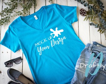 Download Next Level Ideal V 1540 T Shirt Mockup Turquoise V Neck Flat Lay Tee Mock Up Jeans Shoes Styled Stock Photo Svg And Png Ready Free Logo 3d Mockups