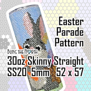 May include: A 30oz skinny straight stainless steel tumbler with a colorful Easter parade pattern featuring a bunny rabbit. The tumbler is decorated with rhinestones and measures 52 x 57 mm.  The text "BLING THE NORTH" is visible on the tumbler.