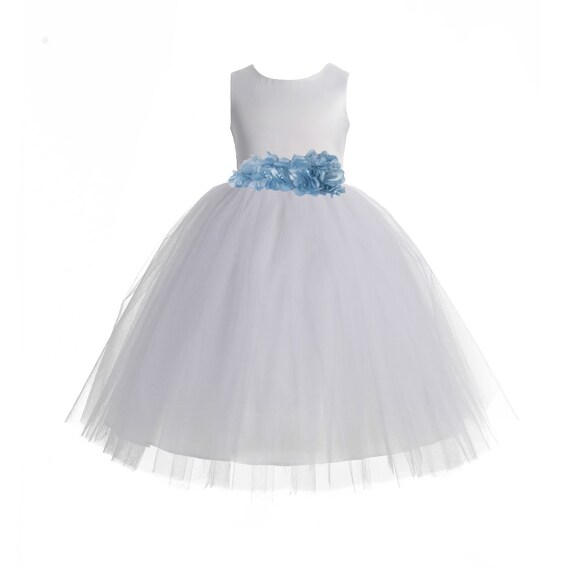 flower girl dress with flower petals in the skirt