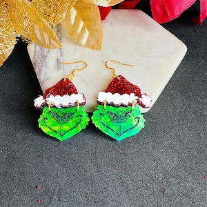 Grinch Earrings Dangle Retro Santa Hat and Grinch Christmas Earrings Glitter Acrylic Earrings Grinchy Mean one Festive Holiday Earrings Gift