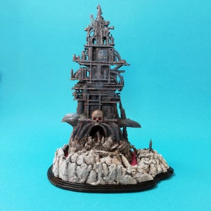 The &quot;Bone Castle&quot; miniatue model. Scale skull and tower diorama.