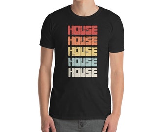 May include: Black t-shirt with the word "HOUSE" repeated five times in a retro style font with a faded color effect. Each word is a different color, starting with red, then orange, yellow, blue, and green.