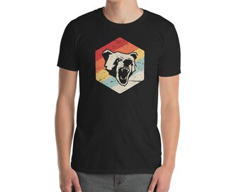 May include: A black t-shirt with a vintage-style graphic of a bear's head in a hexagon. The hexagon is filled with a rainbow of colors, including red, orange, yellow, green, blue, and purple.