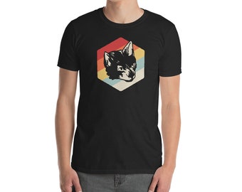 May include: A black t-shirt with a retro-style graphic of a cat's head in a hexagon. The hexagon is filled with a rainbow of colors, including red, orange, yellow, green, blue, and purple.