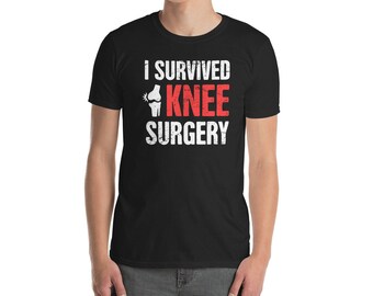 May include: Black t-shirt with white text that reads "I survived knee surgery" and a graphic of a knee with a bandage.