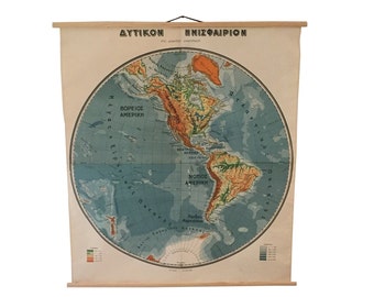 May include: A vintage, cream-colored map of the Americas on a wooden roller. The map is titled "AYTIKON HMIZOAIPION" and shows North and South America in detail. The map is in Greek.