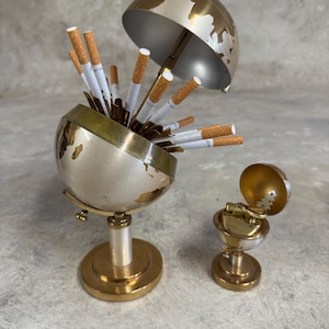 cigarette globe dispenser 1960s Golden Globe Cigarette Dispenser & Lighter, Japanese Vintage Decor,  Functional Tabletop Piece for Home Bar Lovers