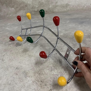 Vintage Industrial Coat Rack: Metal Hooks, Colorful Wood Knobs