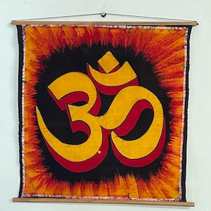 Handmade Batik Wall Hanging – Sacred &quot;Om&quot; Symbol Handmade Batik Fabric with Sacred &quot;Om&quot; Symbol – Unique Spiritual Artwork.