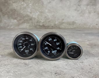Ensemble d'instruments de marine JTS vintage : compteur de vitesse, niveau de carburant, millimètres