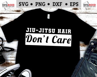 May include: Black t-shirt with white text that reads "JIU-JITSU HAIR Don't Care".