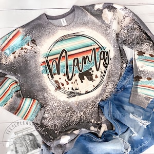 Serape Cowhide Mama Bleached Sweatshirt, Sweaters for women, acid washed cow print accents sublimation design clothing for women