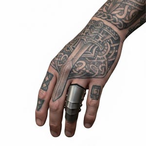May include: A silver finger armour ring with a layered design. The ring has a rectangular top and is connected by small rivets. The ring is worn on a finger with intricate tattoo art.