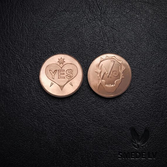 A heavy hand-forged copper coin with 'Yes' on one side and 'No' on the other — part fidget toy, part fate decider, total conversation piece.