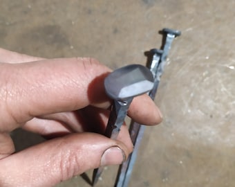 Rectangular head nail, forged iron, black Iron, with barbs