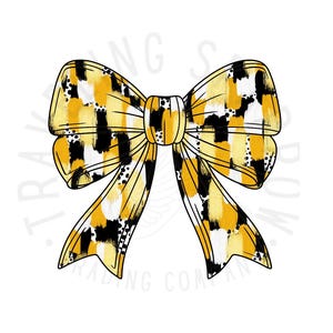 May include: A large yellow and black bow with a white and black abstract pattern. The bow is tied in a knot and the ends are flowing.