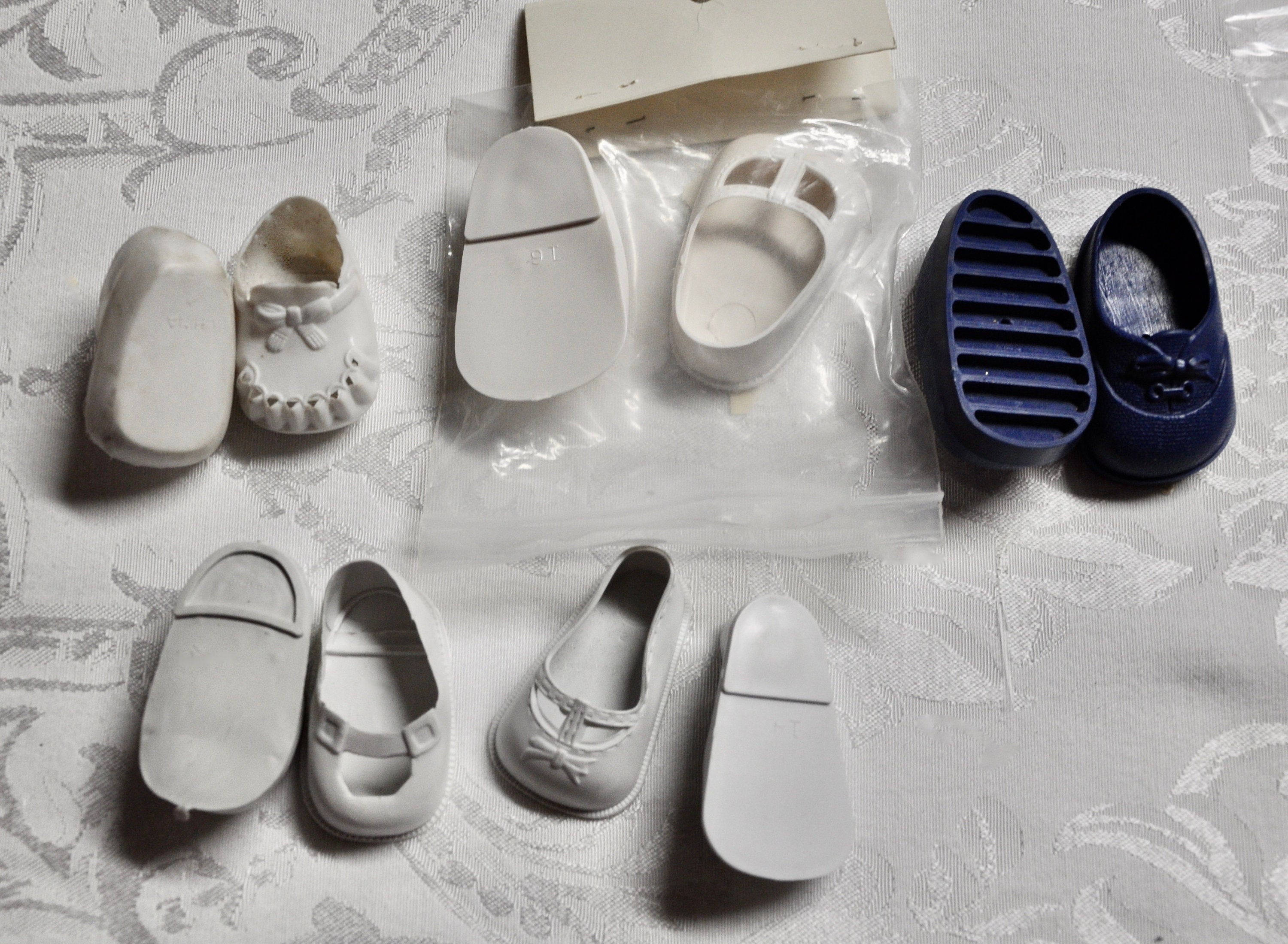 Plastic doll shoes sales