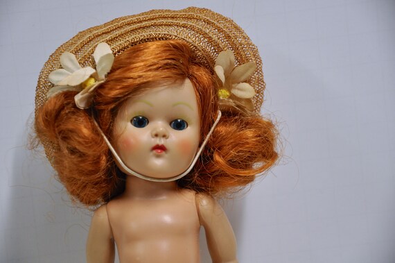 doll with red cheeks