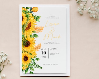 May include: A white wedding invitation with a sunflower border. The invitation reads "Together with their families Louise & Mark Invite you to celebrate their wedding July 10, 2022 at 1 PM Thistle Hotel Bristol Reception to follow."