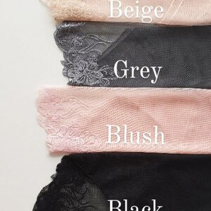 Puede incluir: Primer plano de ocho colores diferentes de tejido transparente con ribete de encaje. Los colores son marr&oacute;n/dorado, negro/plateado, beige, gris, rubor, negro, blanco y azul de mezclilla.