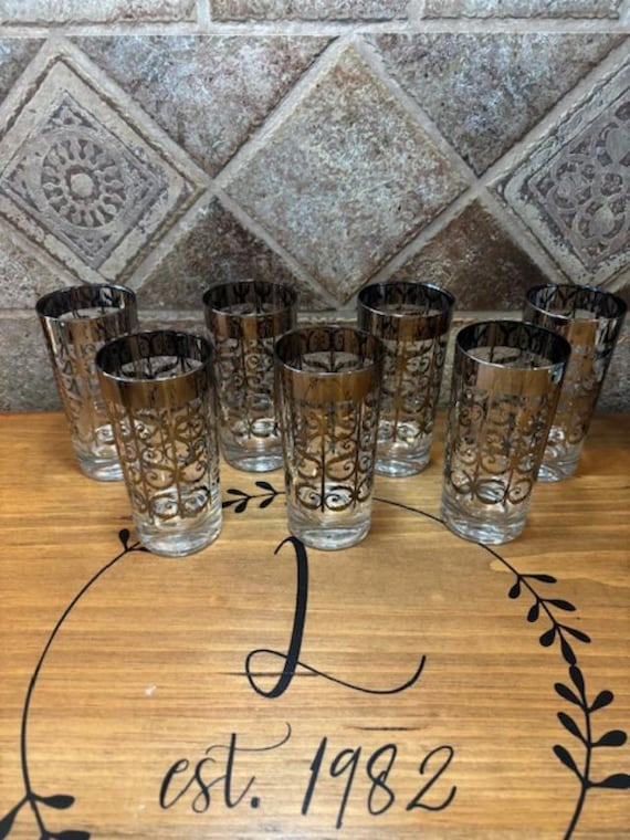 Set of Seven (7) Mid-Century Modern Unmarked Silver Scroll Highball Glasses