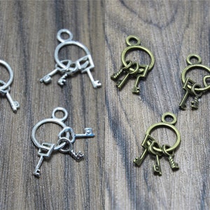 25 Silver & Bronze Tone Key Charms: Zinc Alloy Pendants (25x14mm)