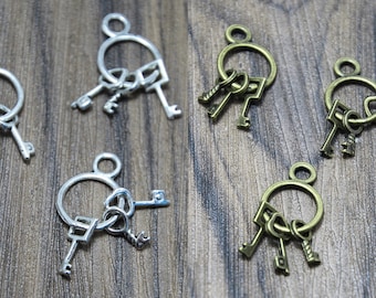 25pcs Ensemble de Touches Charms ton argent / ton bronze Ensemble de touches Charms Pendant 25x14mm