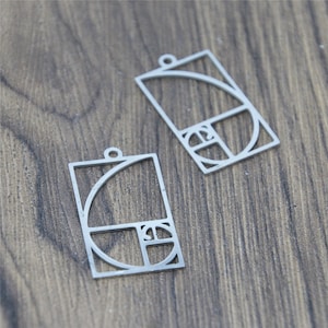 5 pingentes de aço inoxidável com pingentes em espiral dourada Fibonacci: Joias matemáticas (34 x 19 mm)