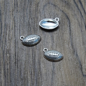 30 Antique Silver Tone Football Charms: Zinc Alloy Pendants (17x11mm)